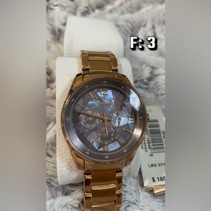 Dark Gold Fossil Watch with dark Abalone face.